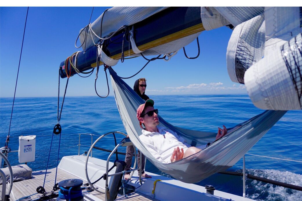 How did sailors stay warm in hammocks while sailing?